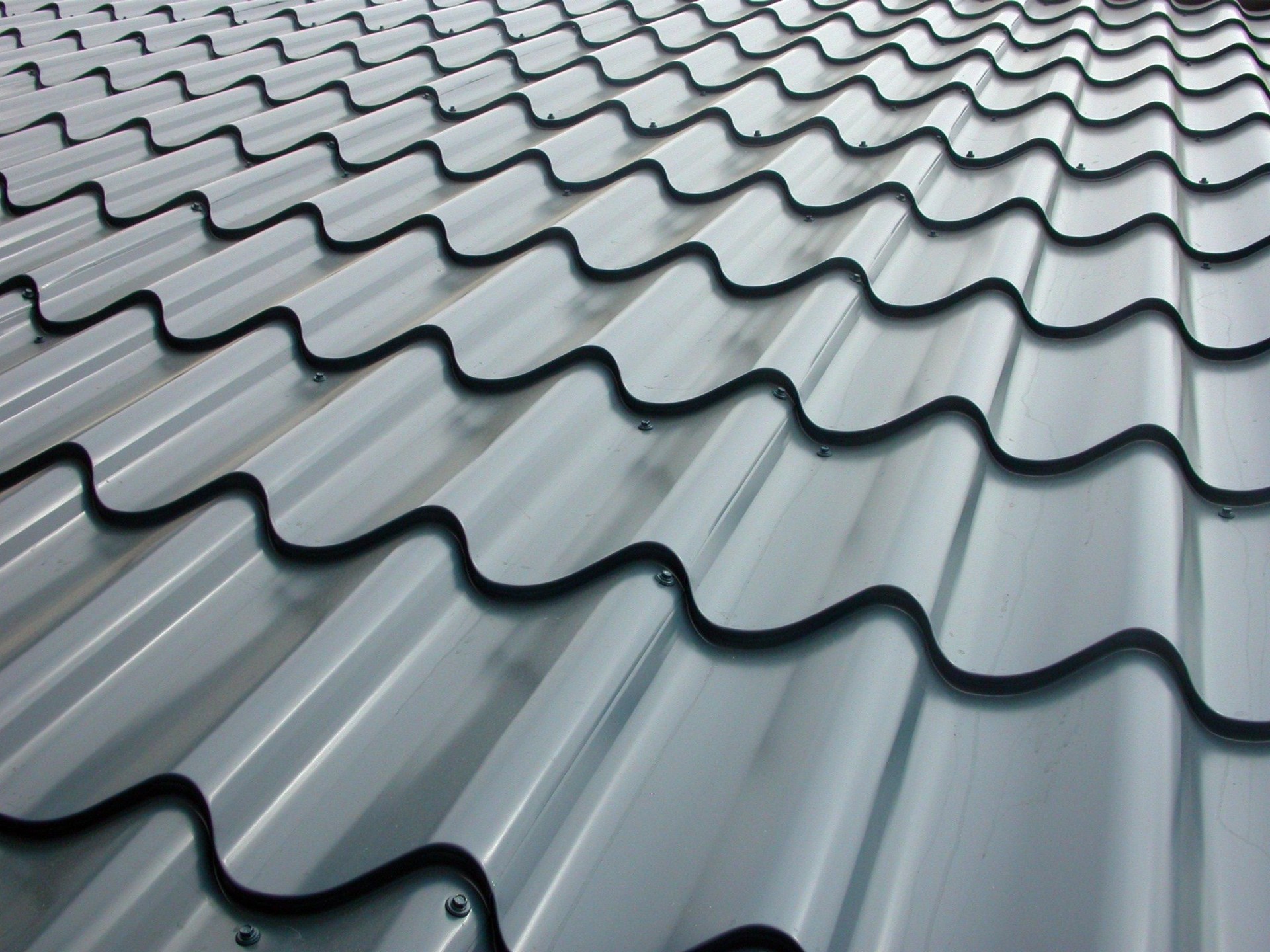 Low angle view across galvanized roof panels